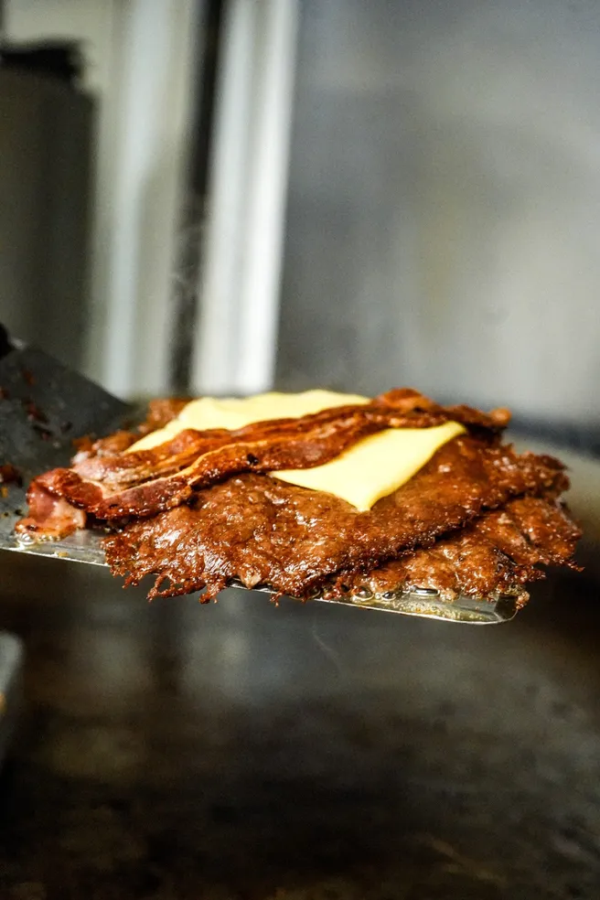 Fresh never-frozen beef patties ready to smash on the grill